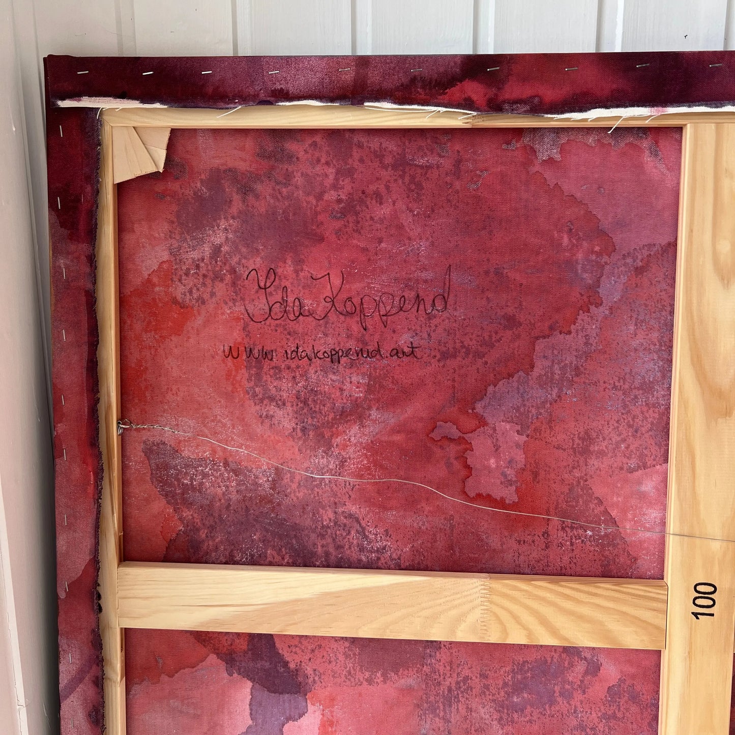 The back and henging wire of VITALITY, original painting by Ida Kopperud