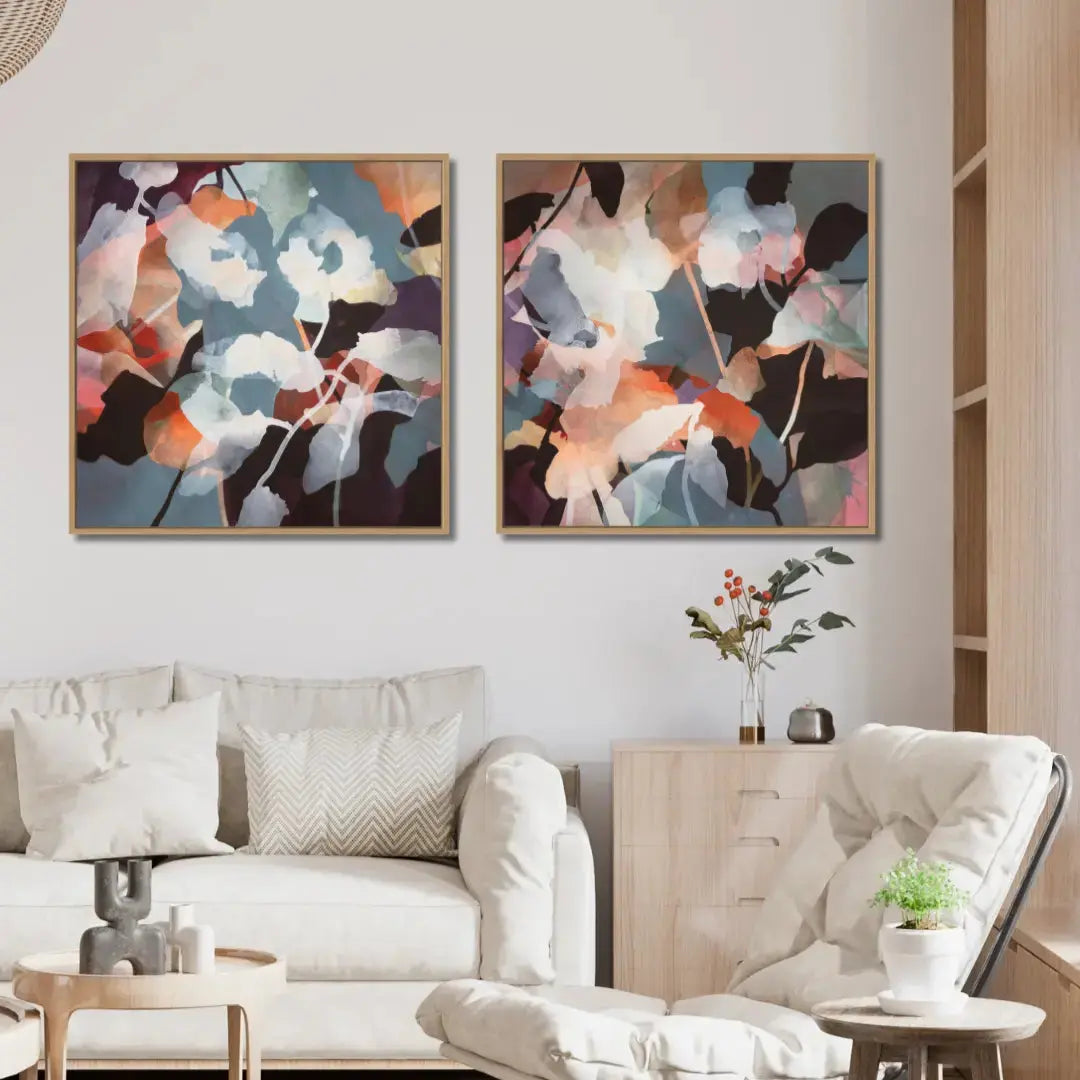 WILDFLOWERS canvas print diptych by Ida Kopperud in modern living room with a white sofa, and decorative items.
