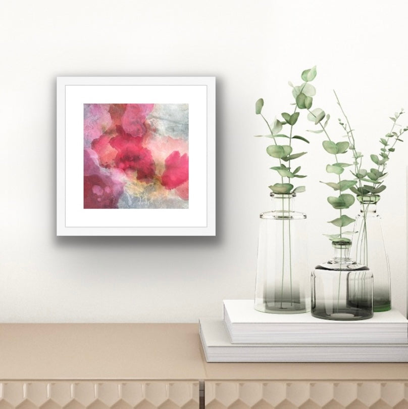 BLUSH print displayed in interior in a white frame