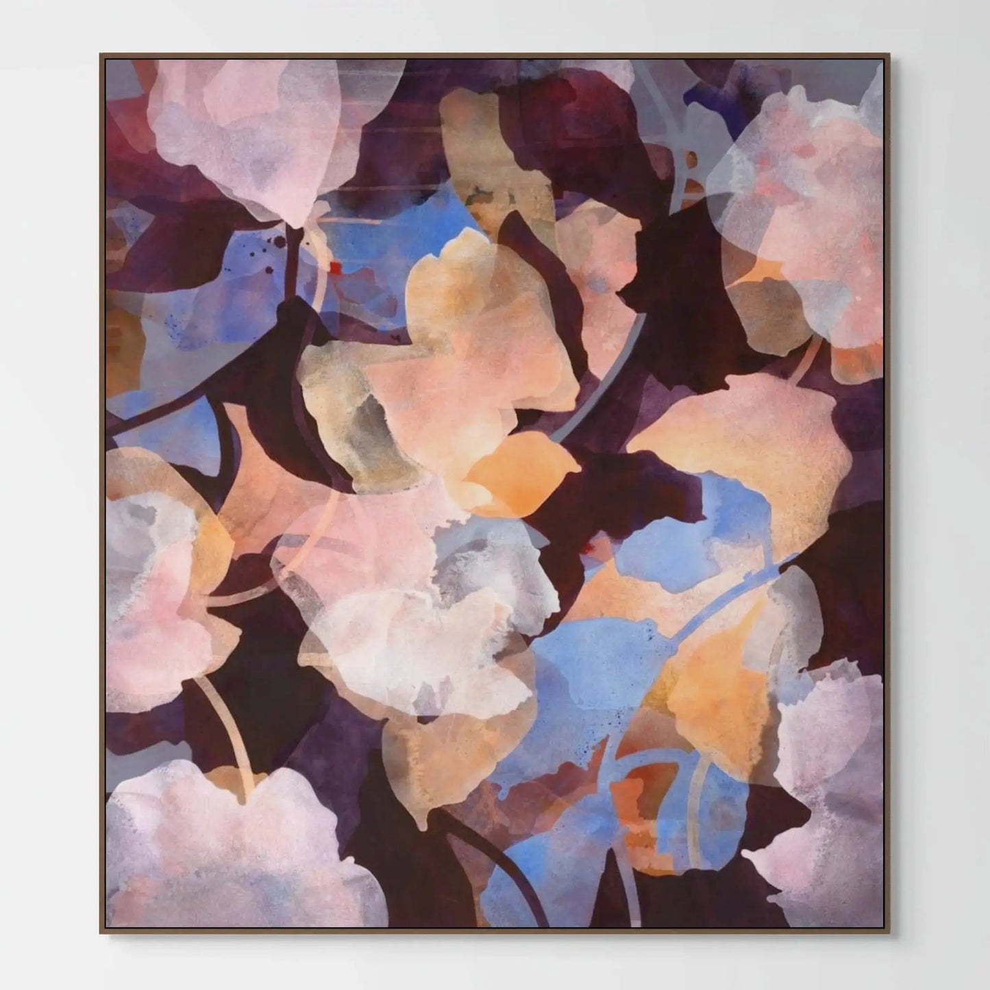 Abstract floral artwork in a frame on a white wall