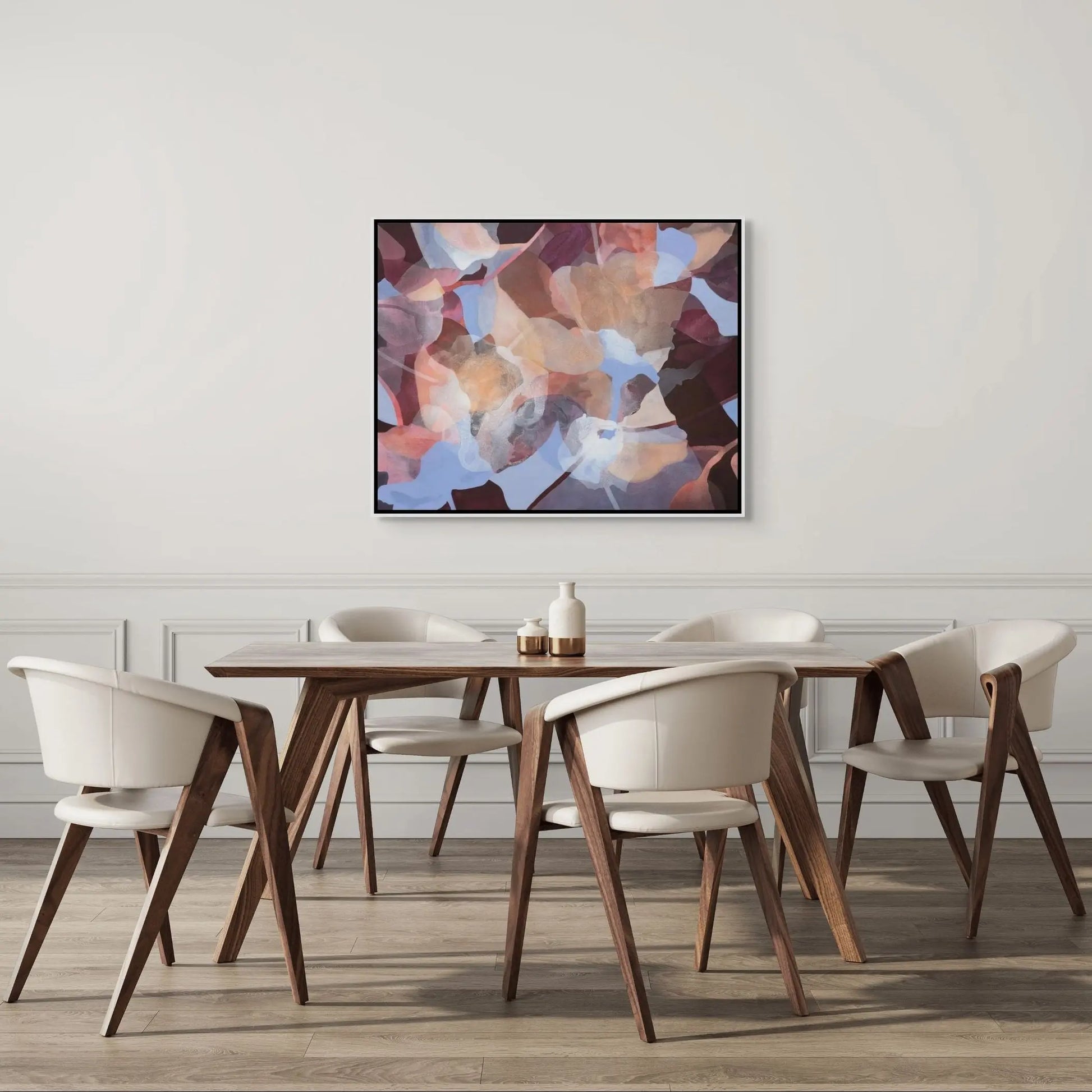 Dining room with wooden table and chairs, abstract painting on the wall.