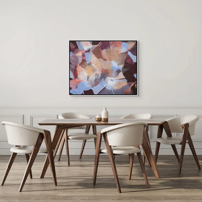 Dining room with wooden table and chairs, abstract painting on the wall.