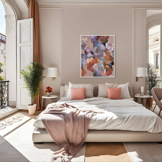 Floral print with white frame above a large bed in luxurious bedroom