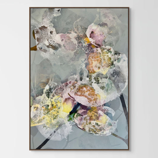 Framed abstract floral artwork on a white wall