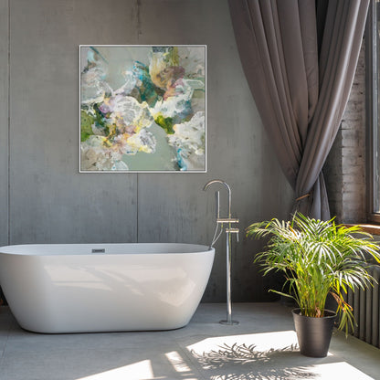 Modern bathroom with a freestanding bathtub, abstract art on the wall, and a potted plant.