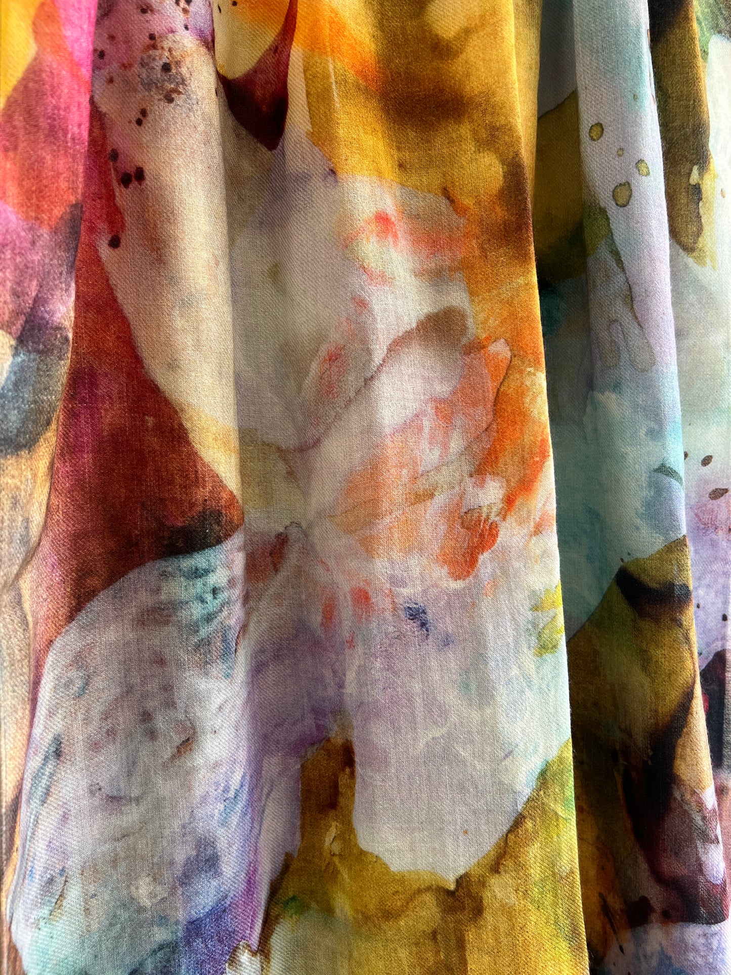 Closeup of art scarf with abstract floral design
