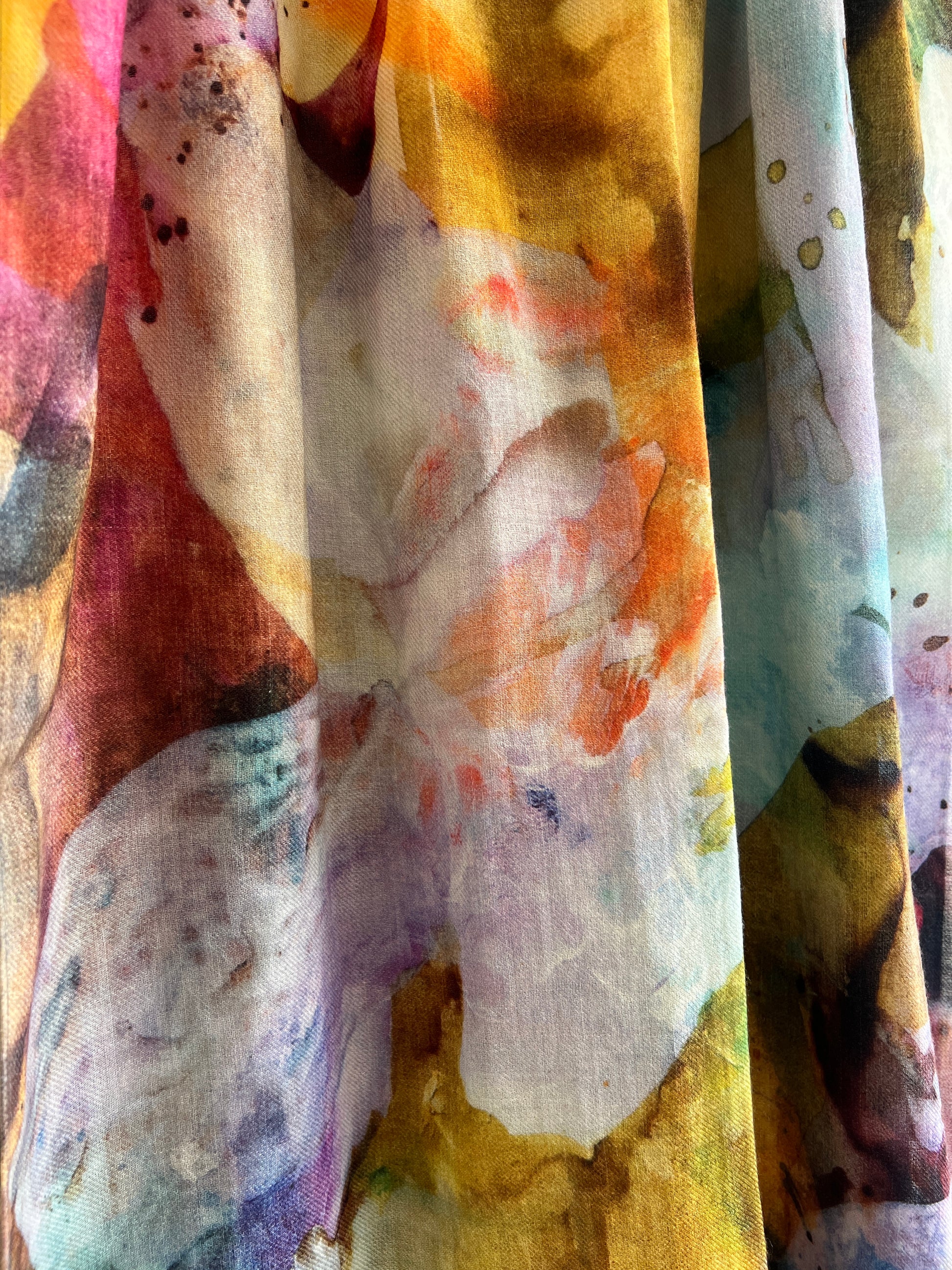 Closeup of art scarf with abstract floral design