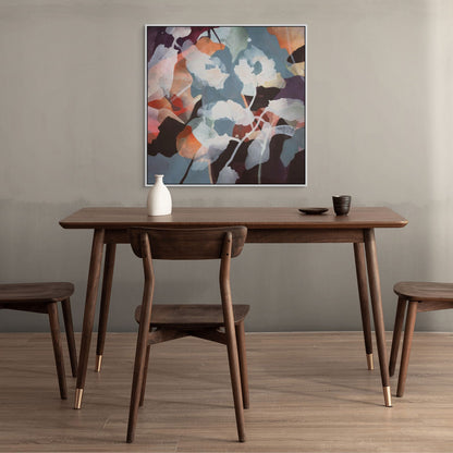Room with wooden dining table with chairs and abstract floral art on the wall.