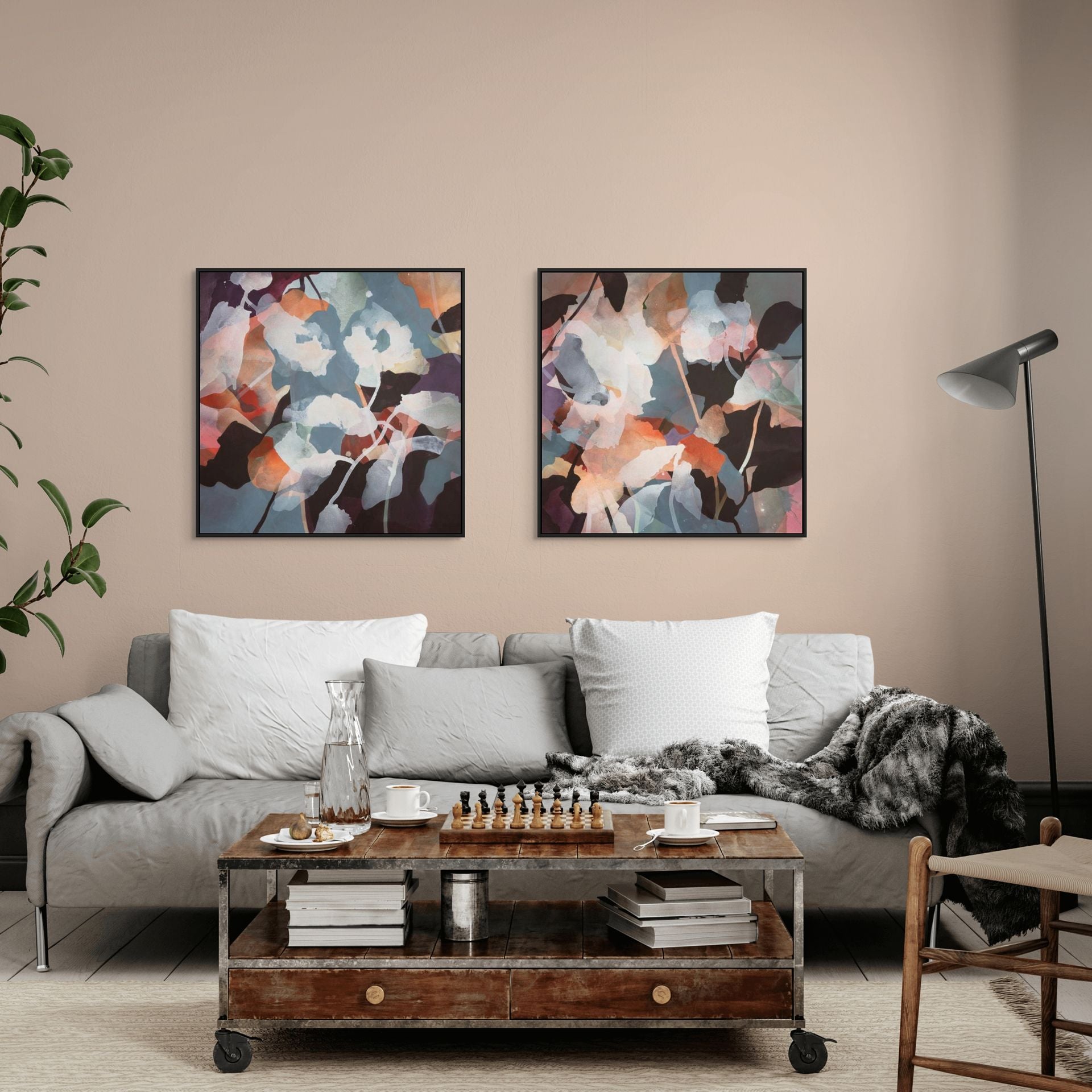 Living room with a gray sofa, wooden coffee table, and abstract wall art.